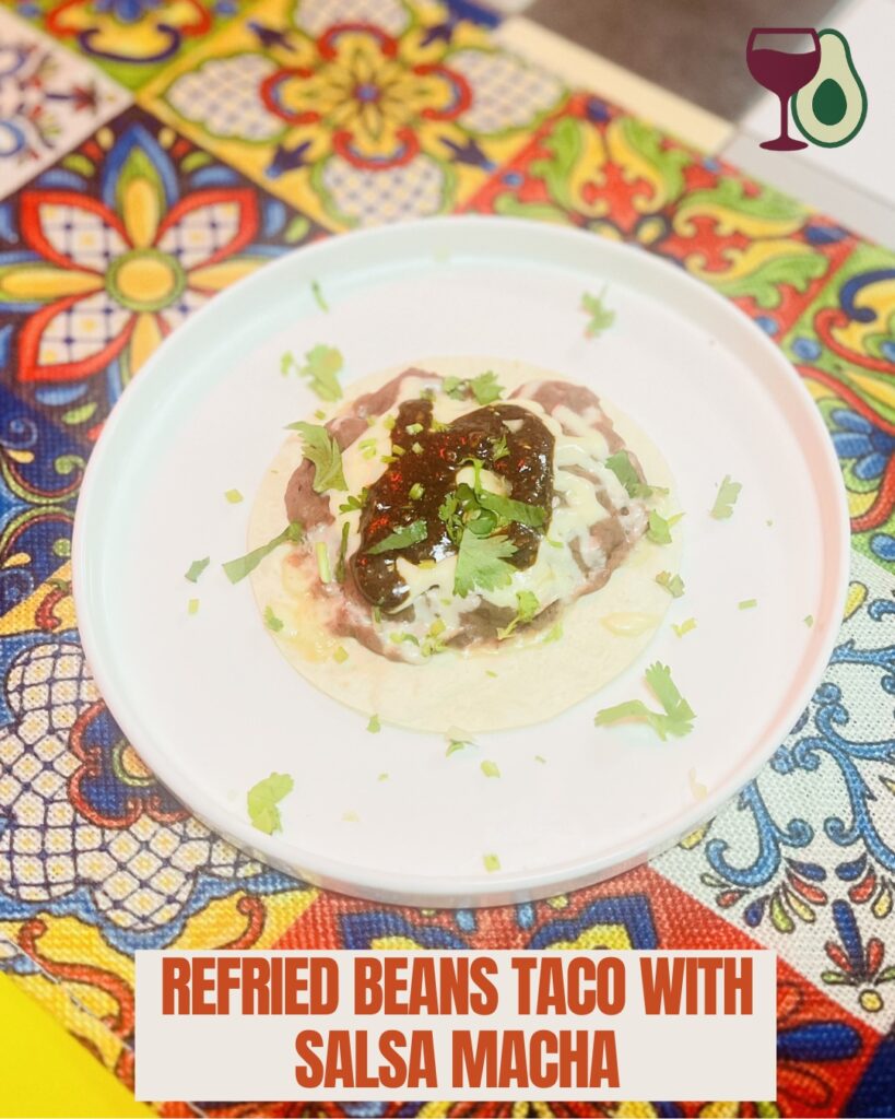 refried beans taco with salsa macha