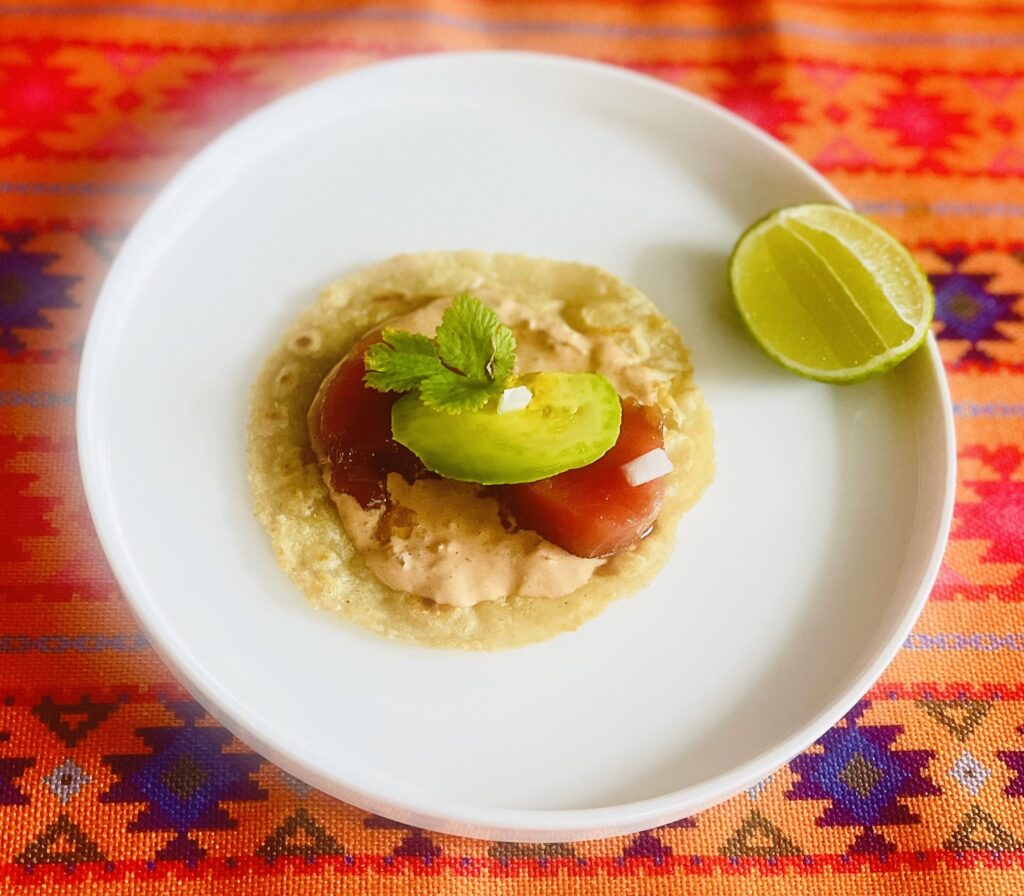 tuna tostada with avocado and chipotle mayo