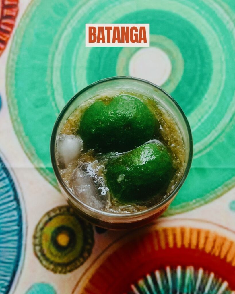 whole squeezed lime in a Batanga cocktail with El Tequileno tequila