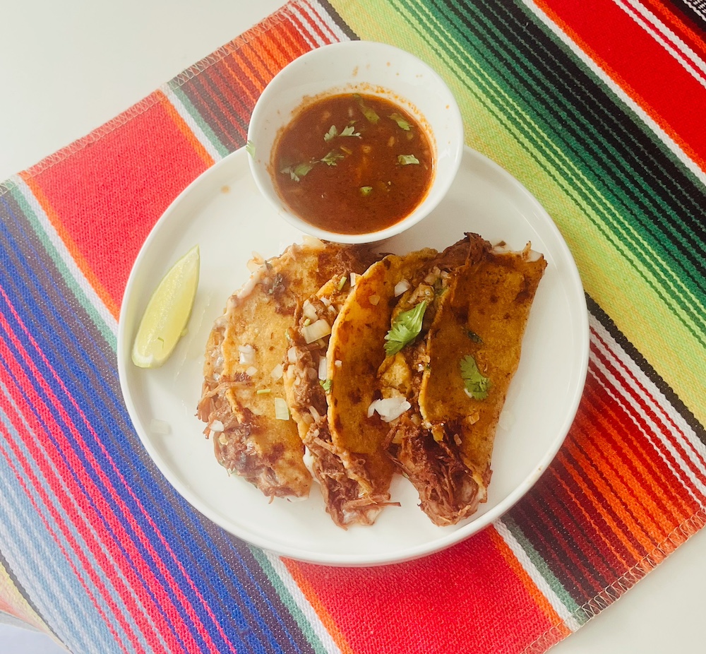 quesabirria tacos with dipping sauce