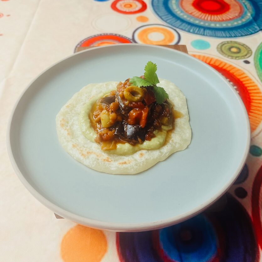 my aubergine Veracruz, avocado crema on a wheat tortilla